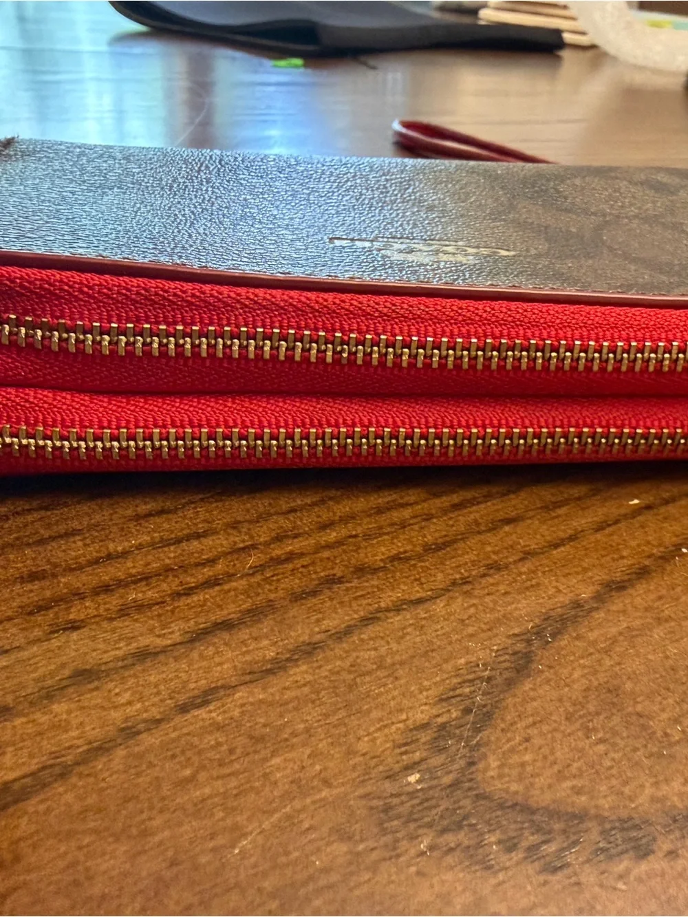 Coach signature zip